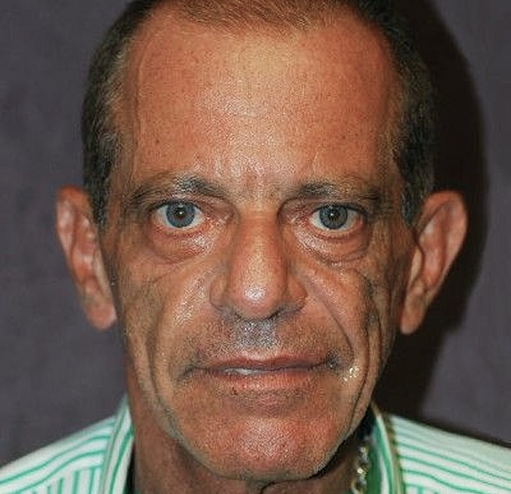 Close-up portrait of an older man.