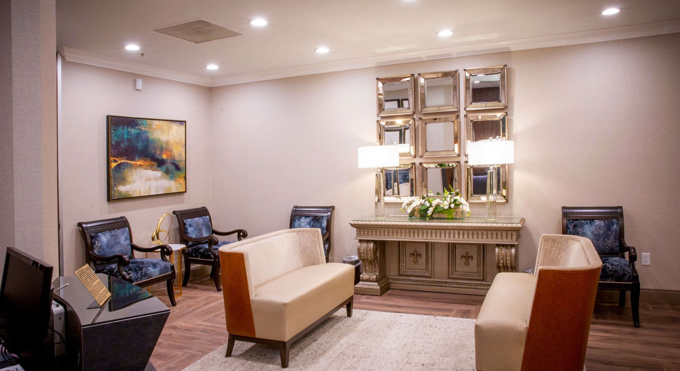 Modern waiting room with elegant decor and lighting.