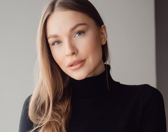 Portrait of a woman with long hair.