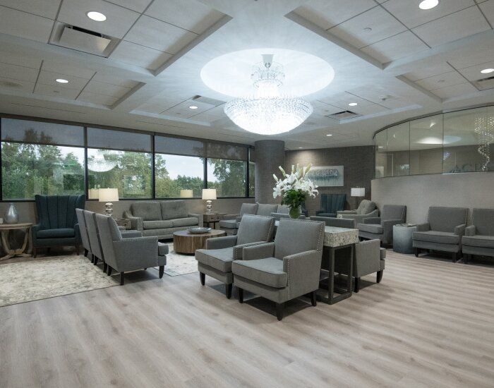 Modern waiting room with elegant furniture and decor.